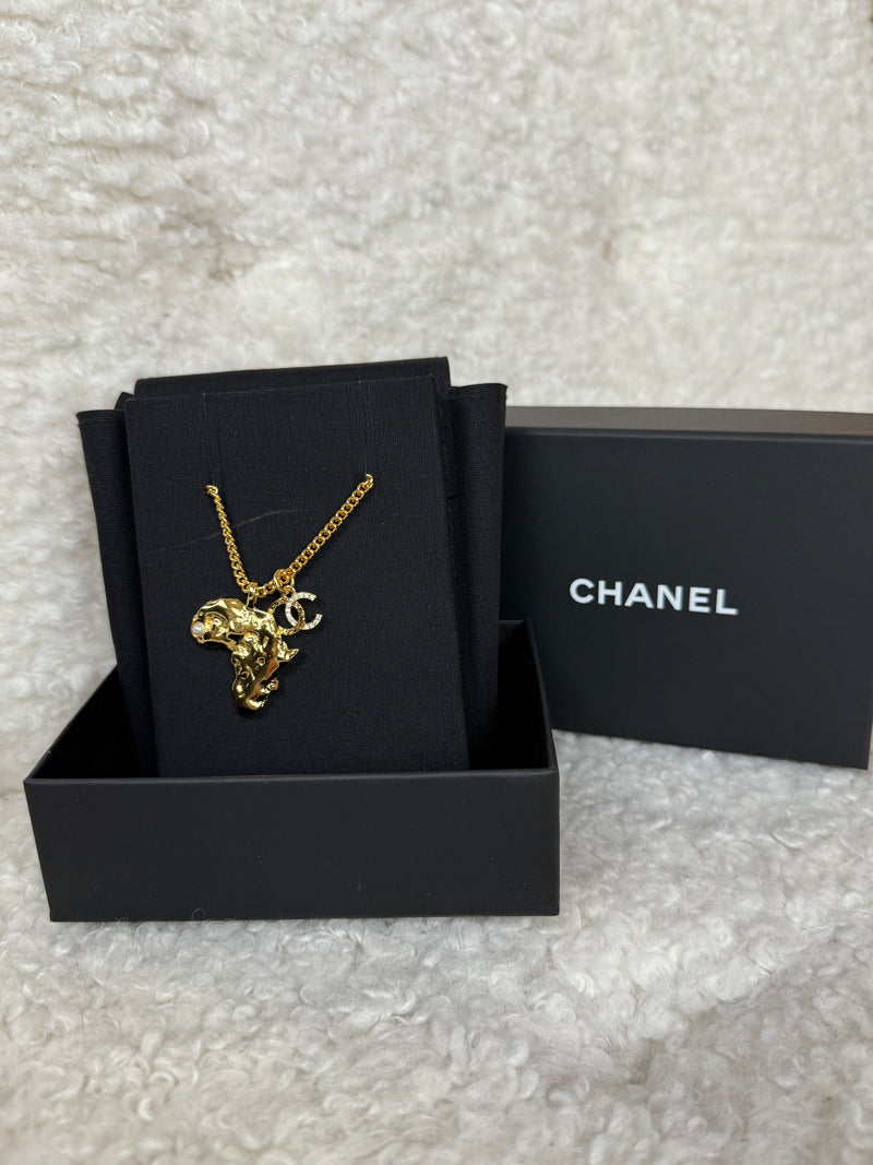 Chanel Gold Plated Africa Necklace