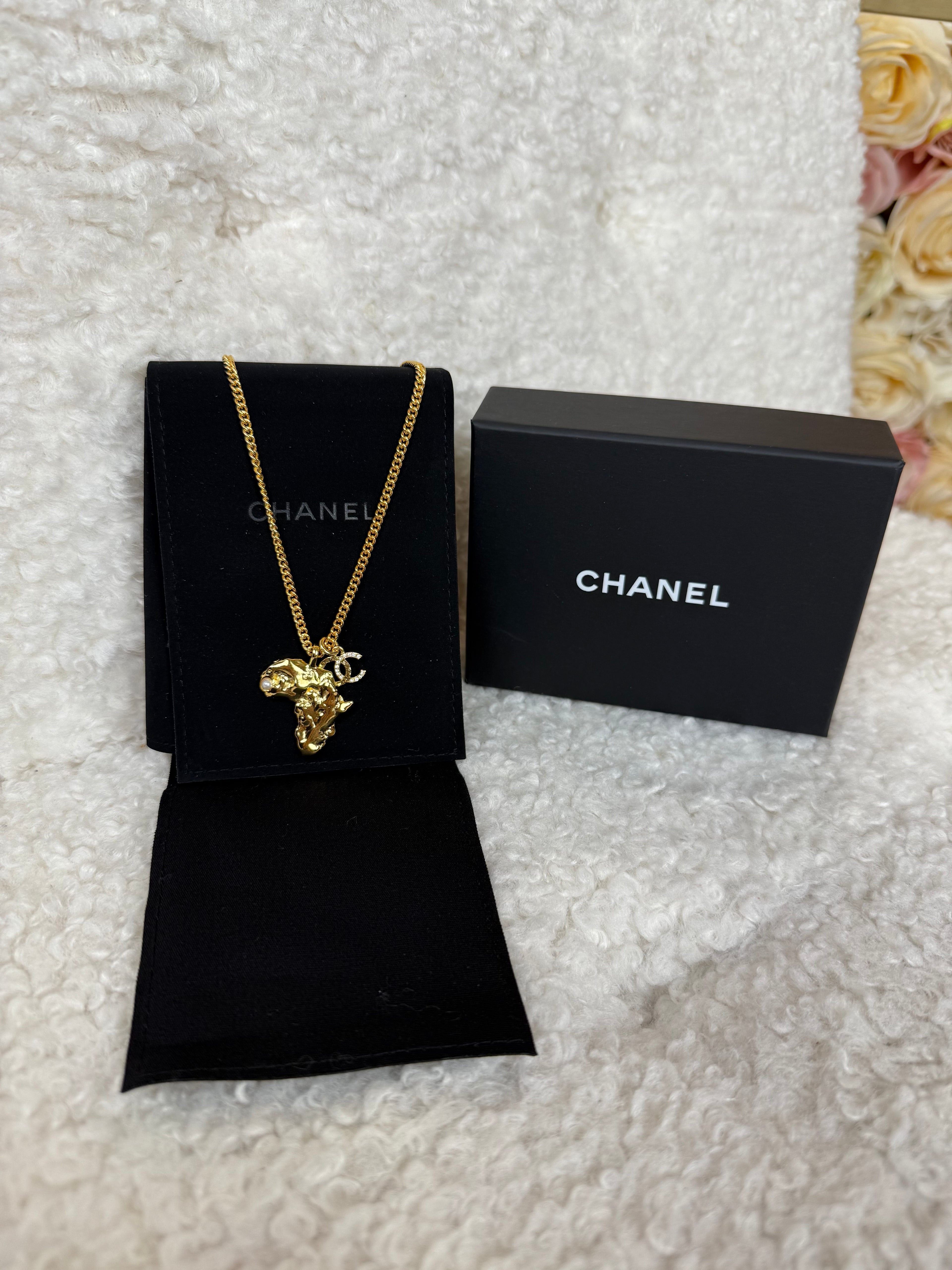 Chanel Gold Plated Africa Necklace