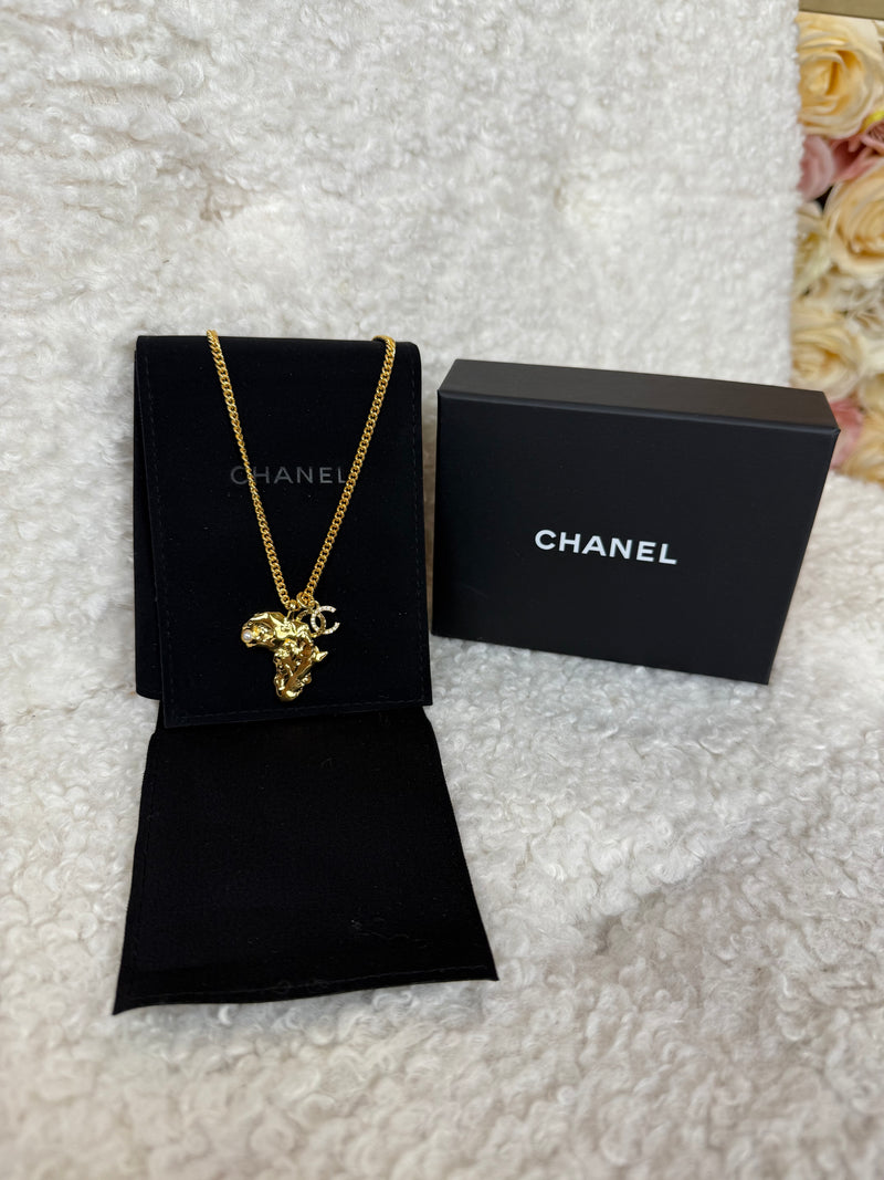 Chanel Gold Plated Africa Necklace